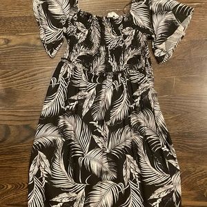 black beach dress with leafs